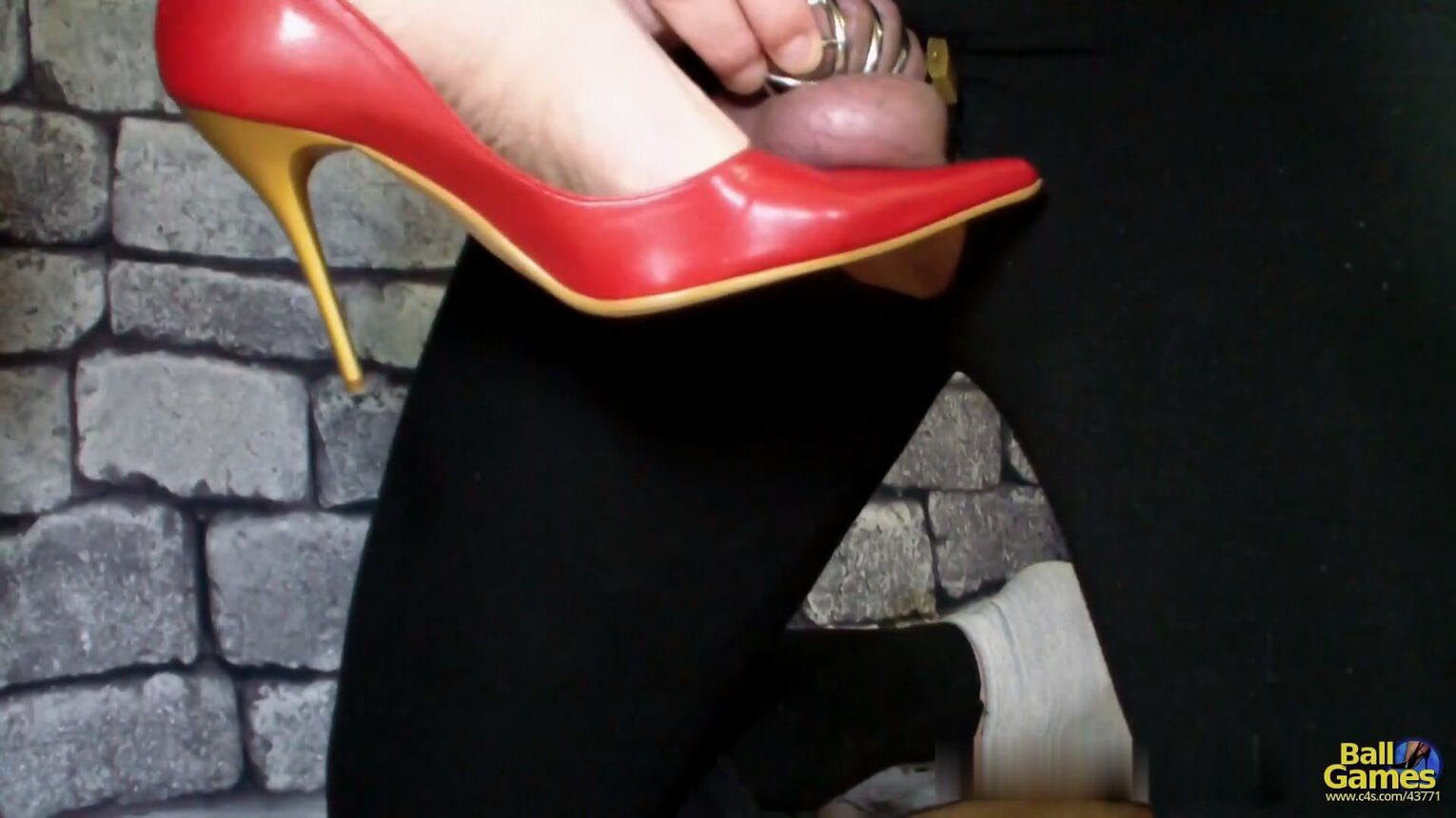 Red Pumps vs Chastity Cage